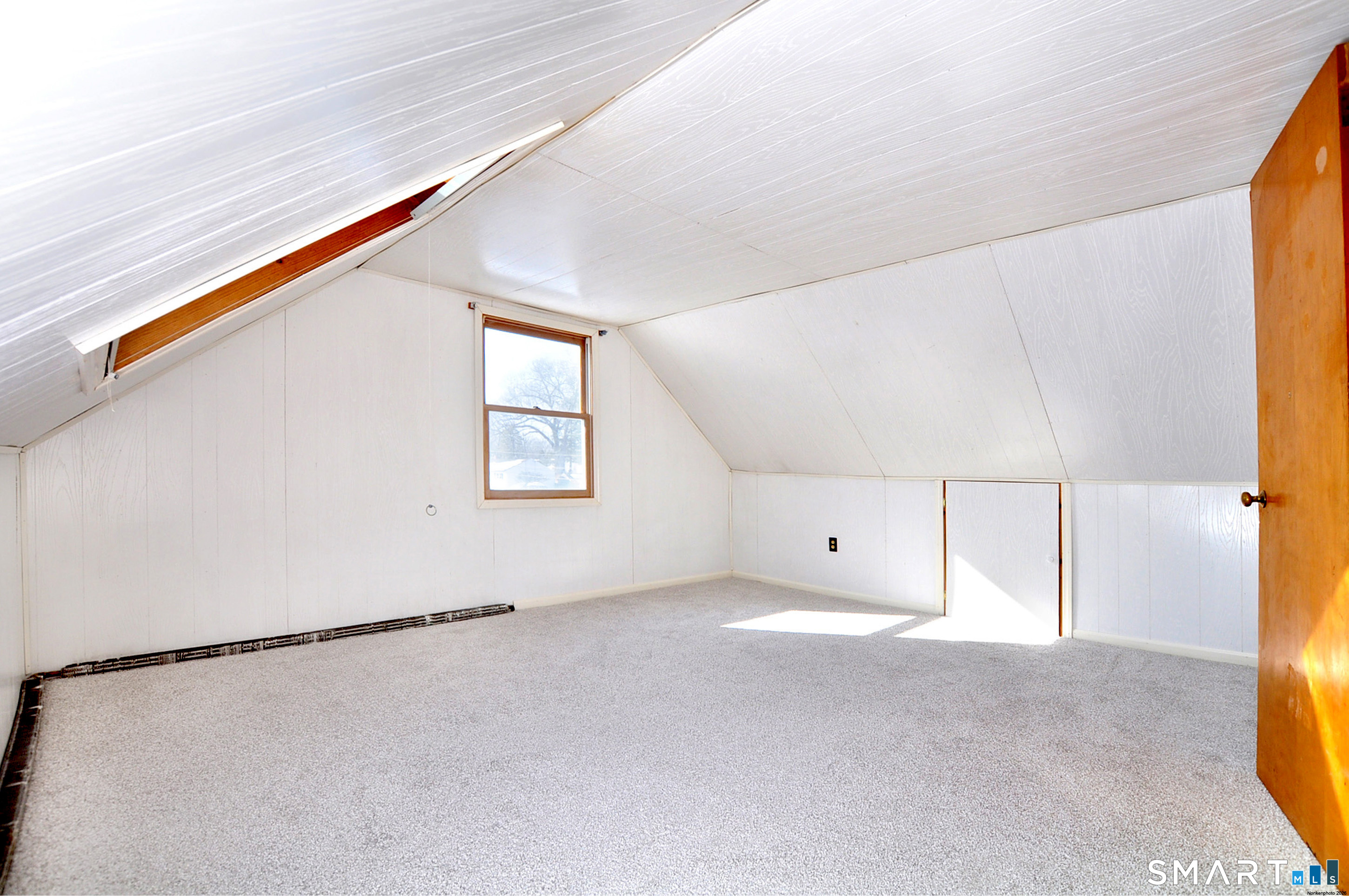 18 Play Road Enfield, CT 06082 - Photo 7 of 40 Sun-filled 2nd floor bedroom has new wall to wall carpeting.