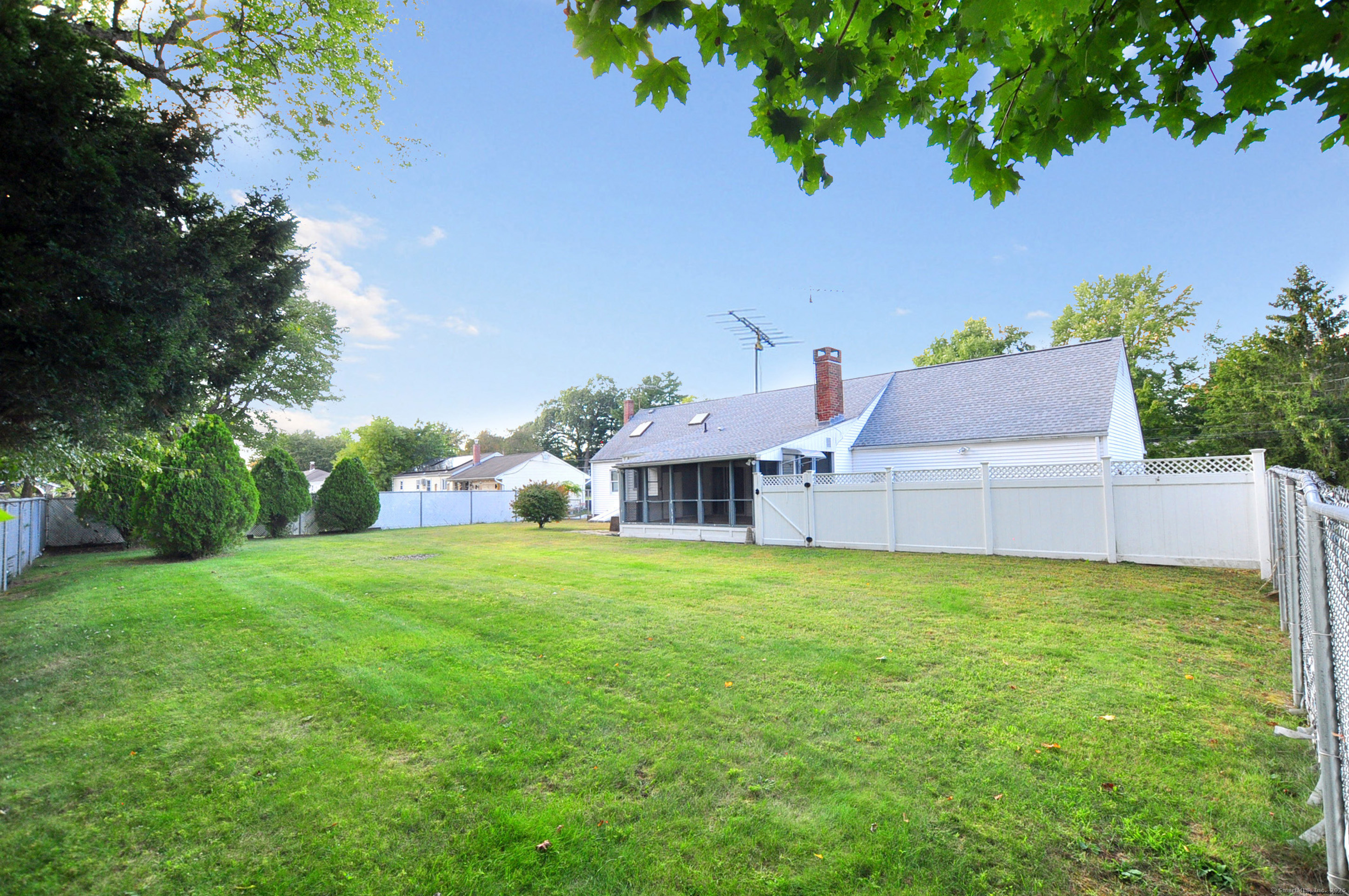 18 Play Road Enfield, CT 06082 - Photo 9 of 40 The backyard is level and fully fenced in.
