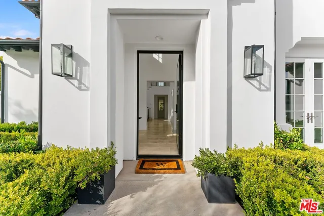 a view of a livingroom with furniture and windows