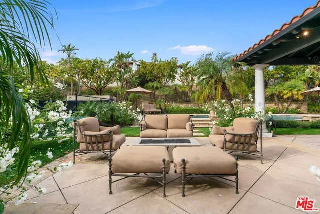 a view of a swimming pool with a garden