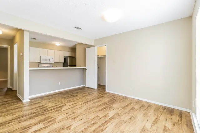 a view of kitchen with wooden floor