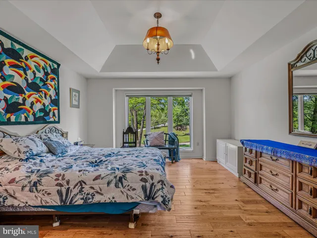 a bathroom with a shower and a toilet