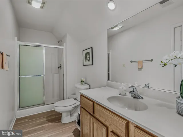 an aerial view of a house with a garden