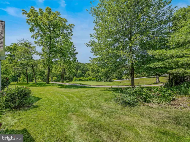 a view of a city with mountains in the background