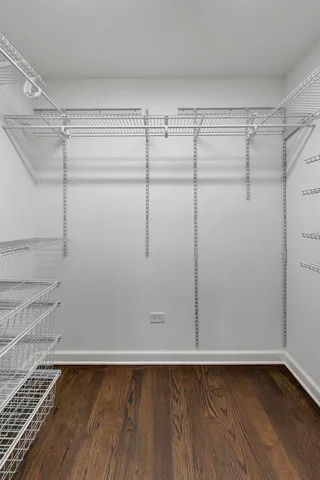 a view of an empty walk in closet