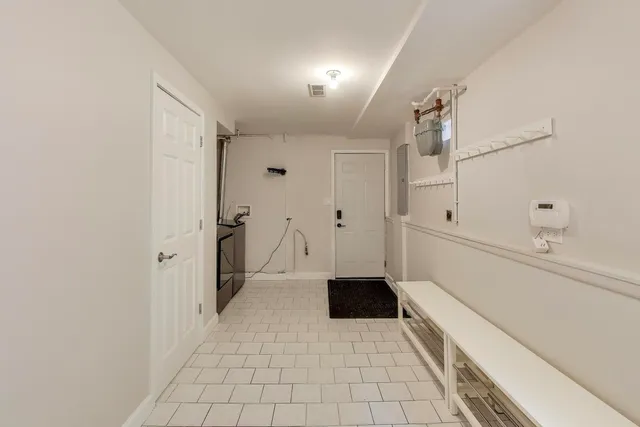 a bathroom with a sink and a shower