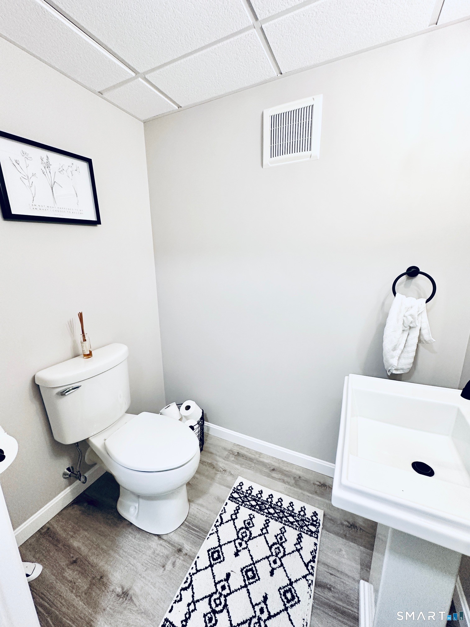 29 Logans Lane Thompson, CT 06277 - Photo 32 of 40 a bathroom with a toilet and a sink