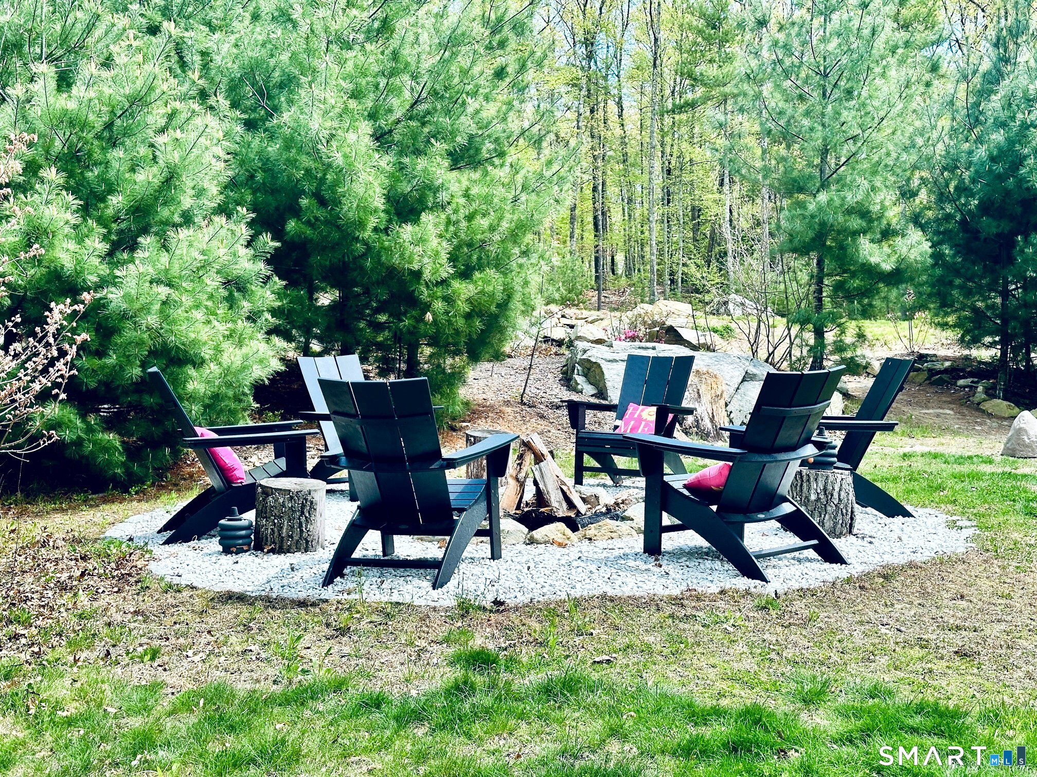 29 Logans Lane Thompson, CT 06277 - Photo 36 of 40 an outdoor sitting area with furniture and garden