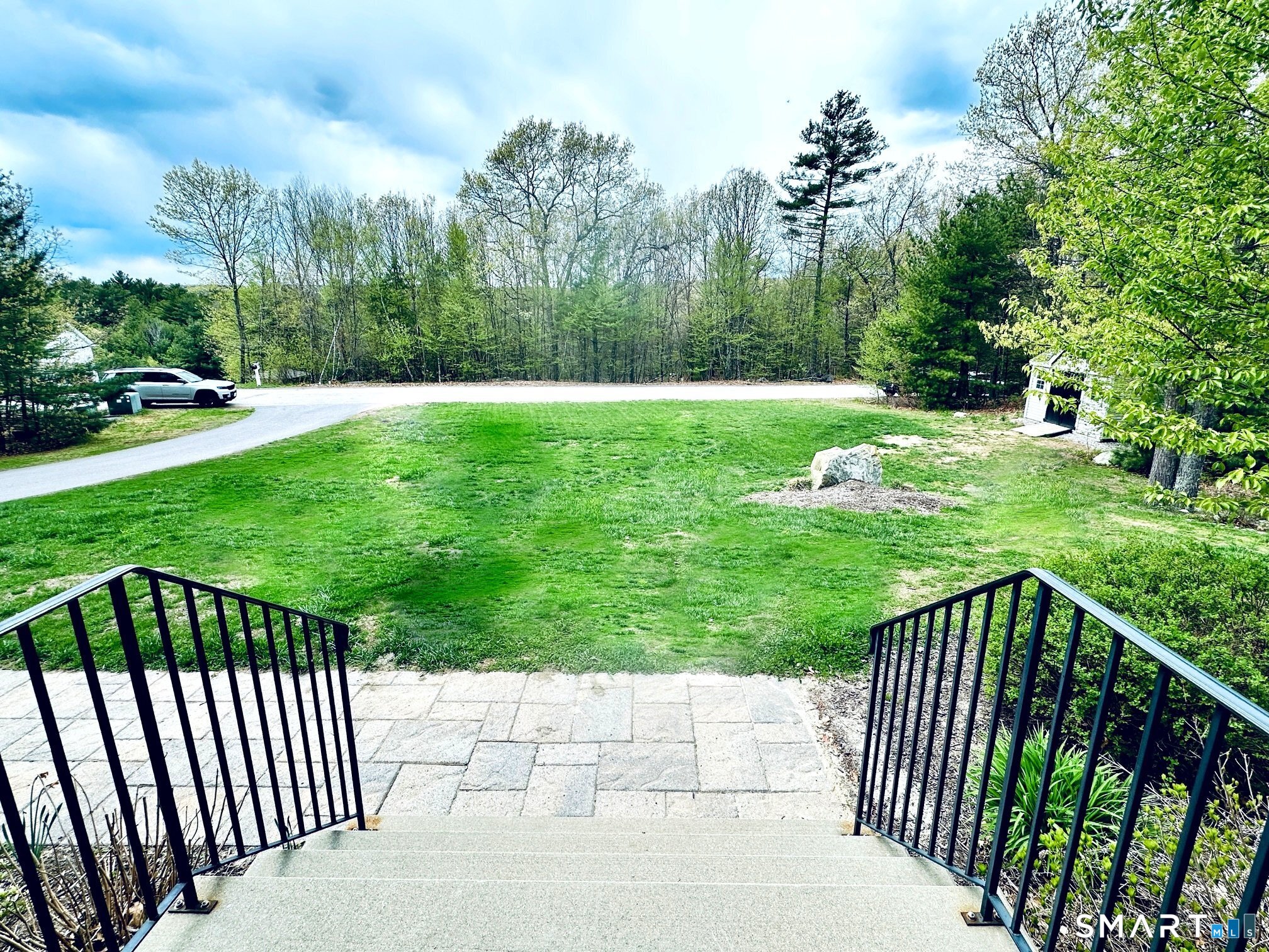 29 Logans Lane Thompson, CT 06277 - Photo 6 of 40 a view of a yard with large trees