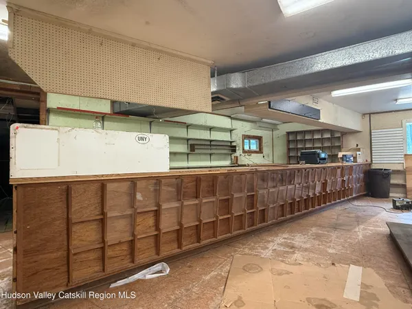 a room with lots of wooden cabinets