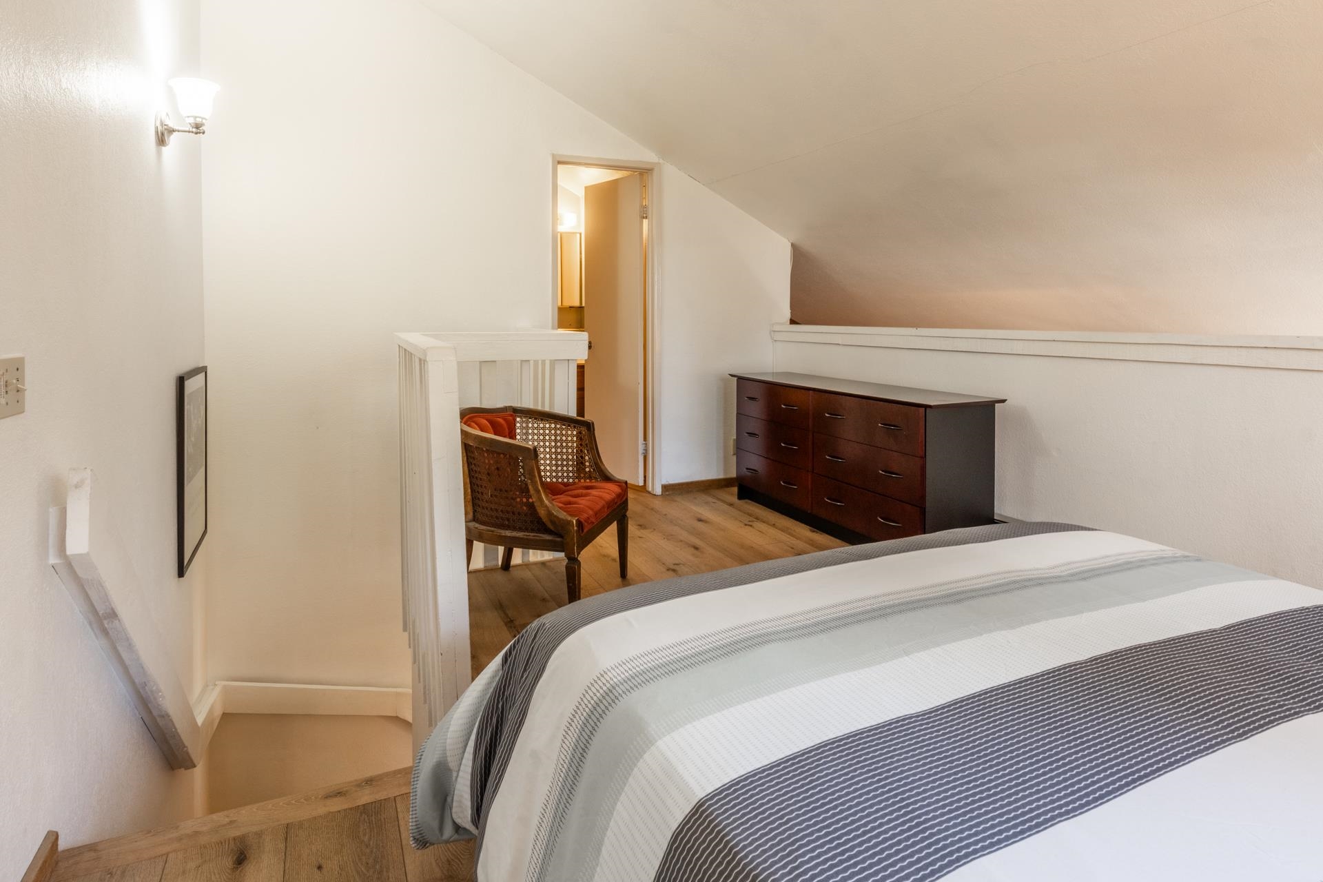 153 Lake Mary Road, Unit 132 Mammoth Lakes, CA 93546 - Photo 15 of 32 Bedroom with lofted ceiling and light wood-style flooring