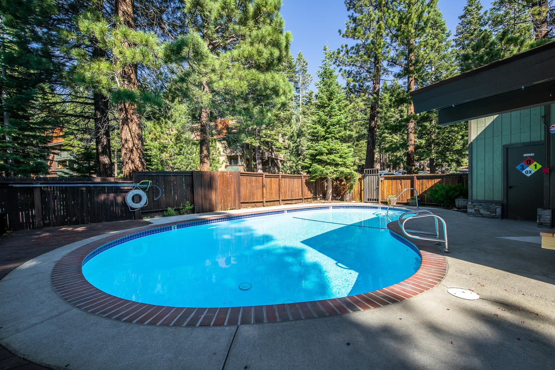 153 Lake Mary Road, Unit 132 Mammoth Lakes, CA 93546 - Photo 15 of 20 View of pool with a patio area and a fenced backyard