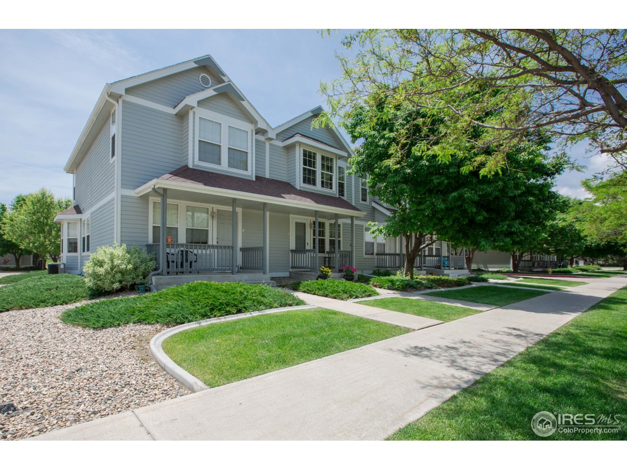 1115 West Swallow Road, Unit 7 Fort Collins, CO 80526 - Photo 1 of 20 Front of Townhome