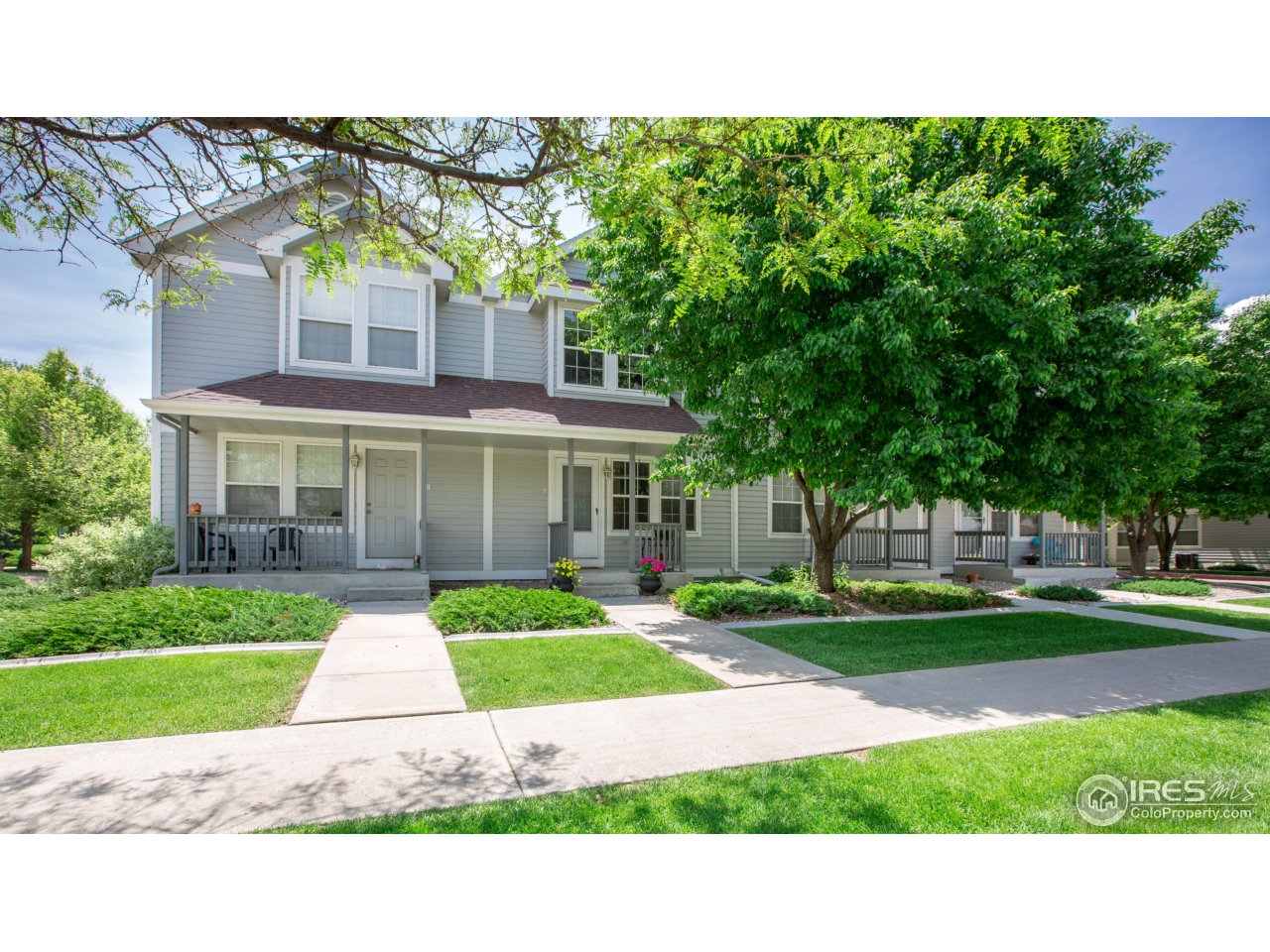 1115 West Swallow Road, Unit 7 Fort Collins, CO 80526 - Photo 2 of 20 Front of Townhome