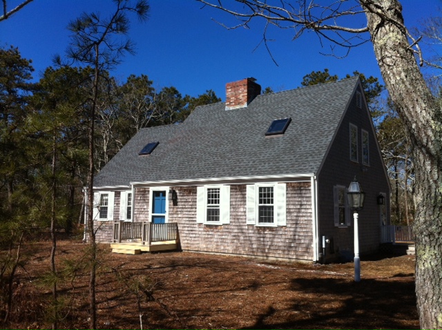59 Marthas Road Edgartown, MA 02539 - Photo 2 of 17 a front view of a house with a yard