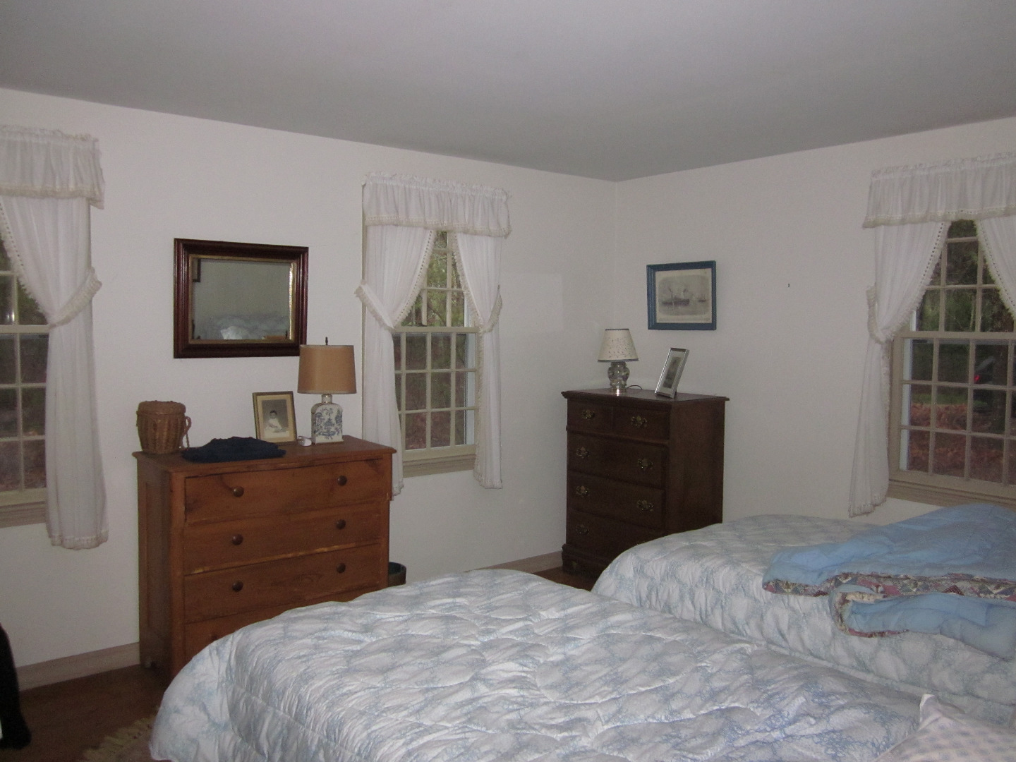 59 Marthas Road Edgartown, MA 02539 - Photo 12 of 17 a bedroom with a bed and a flat screen tv