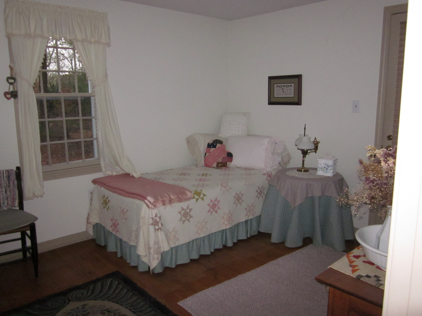 59 Marthas Road Edgartown, MA 02539 - Photo 13 of 17 a bedroom with a bed and a window