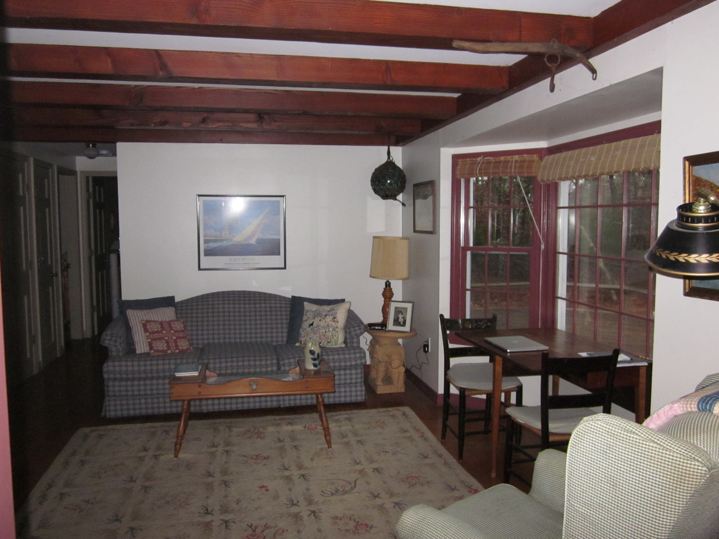 59 Marthas Road Edgartown, MA 02539 - Photo 6 of 17 a living room with furniture and a floor to ceiling window