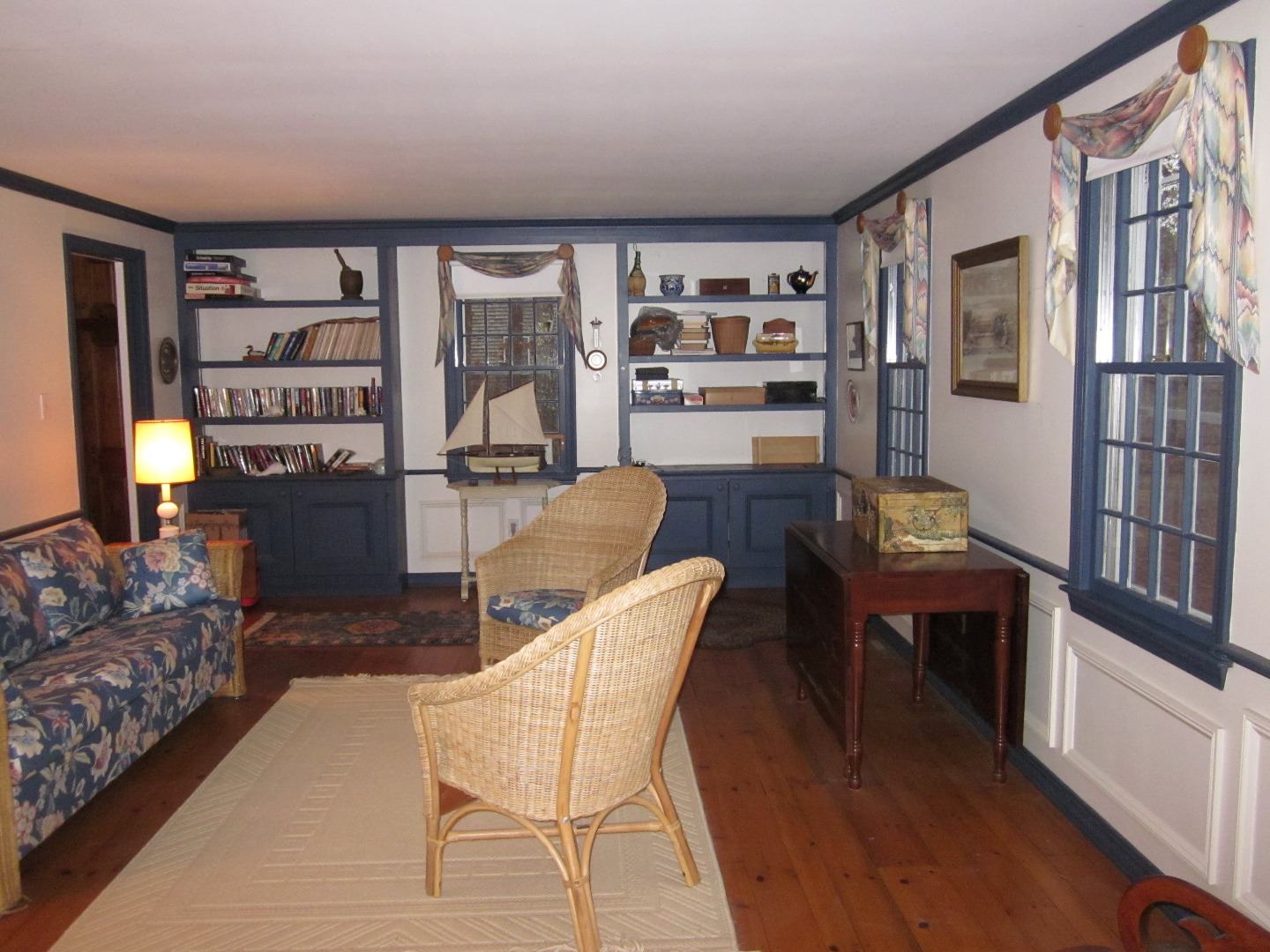 59 Marthas Road Edgartown, MA 02539 - Photo 8 of 17 a living room with furniture a rug and a large window