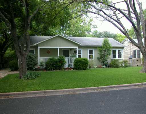 1309 Ruth Avenue Austin, TX 78757 - Photo 1 of 1 a front view of a house with a yard