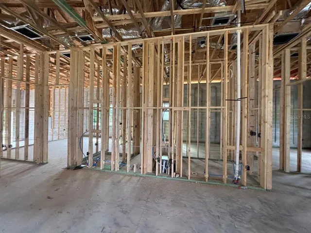 a view of a room with wooden walls
