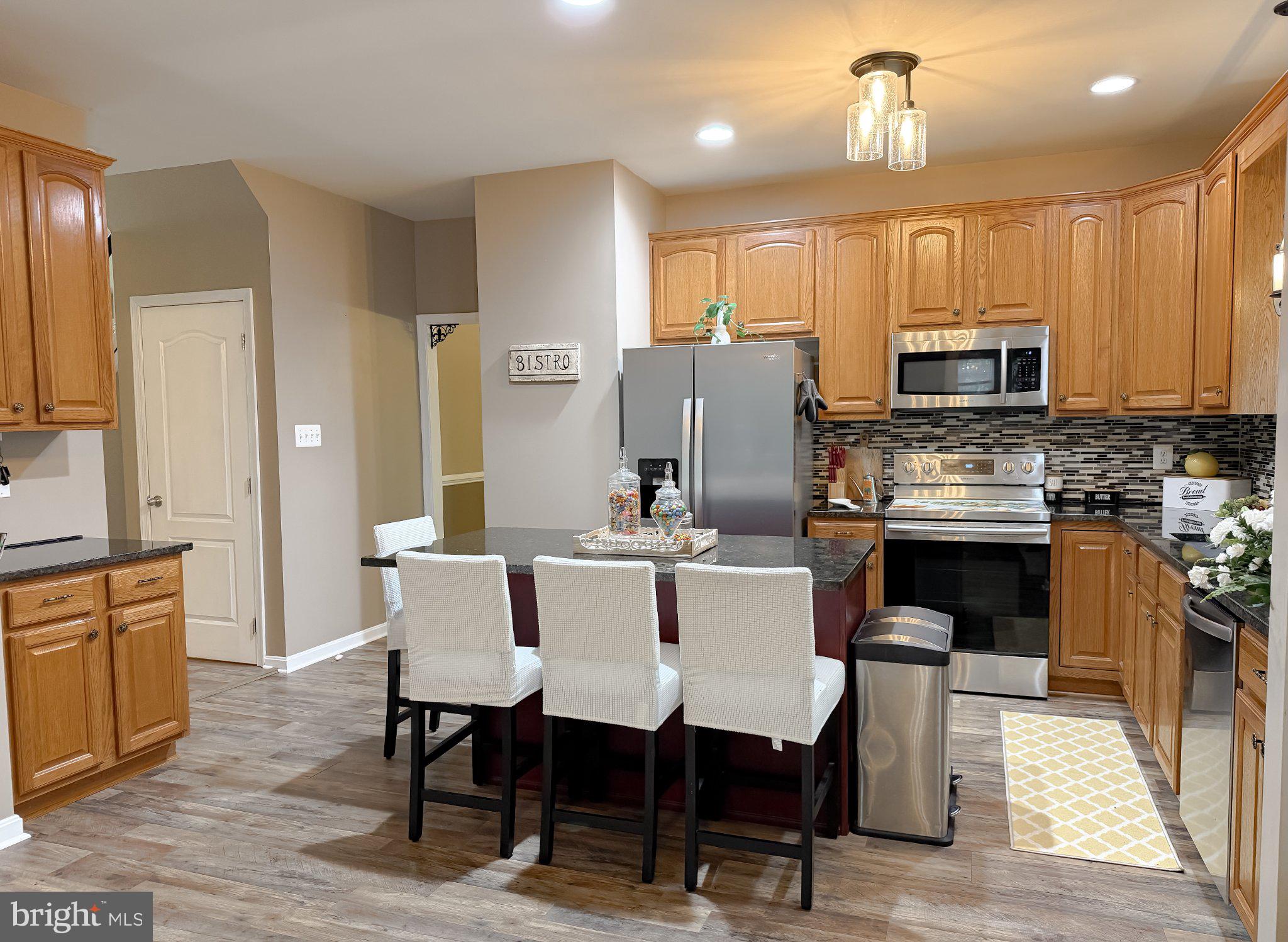 6020 Port Tobacco Road Indian Head, MD 20640 - Photo 25 of 59 Modern kitchen with warm wood tones.