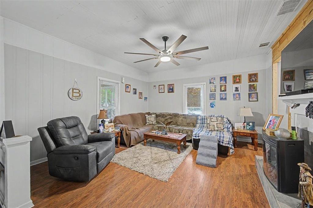 483 Coal Road Northwest Resaca, GA 30735 - Photo 12 of 56 a living room with furniture and a wooden floor