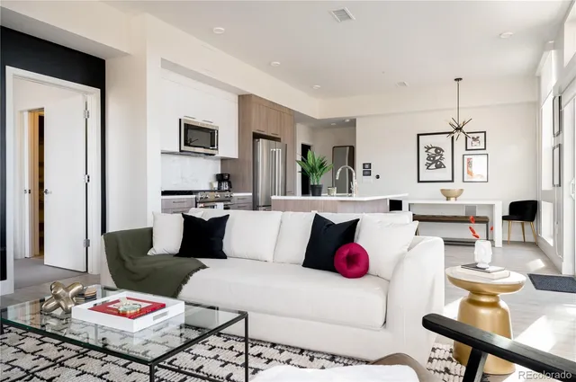 a living room with furniture and rug