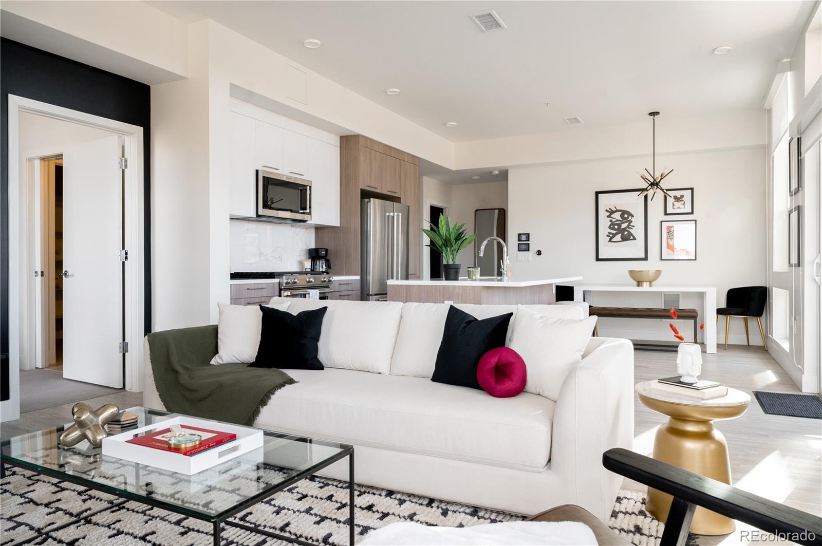 2880 Zuni Street, Unit 404 Denver, CO 80211 - Photo 15 of 30 a living room with furniture and rug