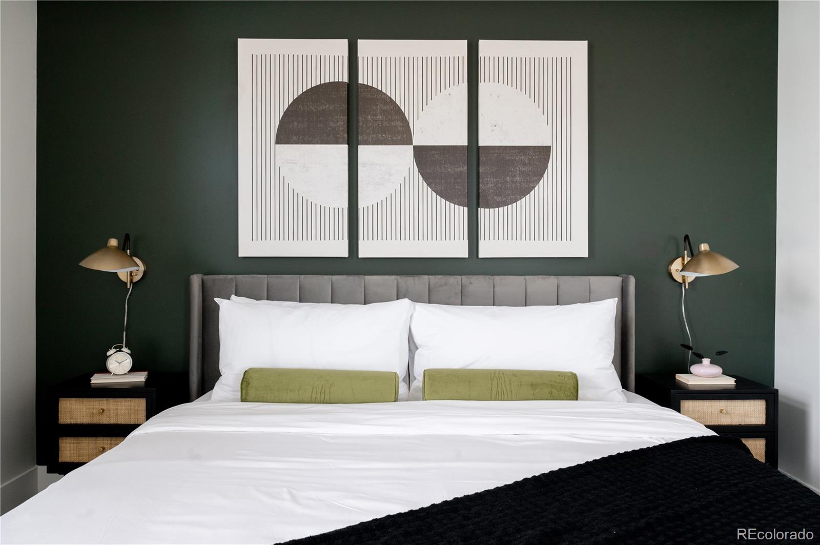 2880 Zuni Street, Unit 404 Denver, CO 80211 - Photo 18 of 30 a bedroom with a bed and a painting on the wall