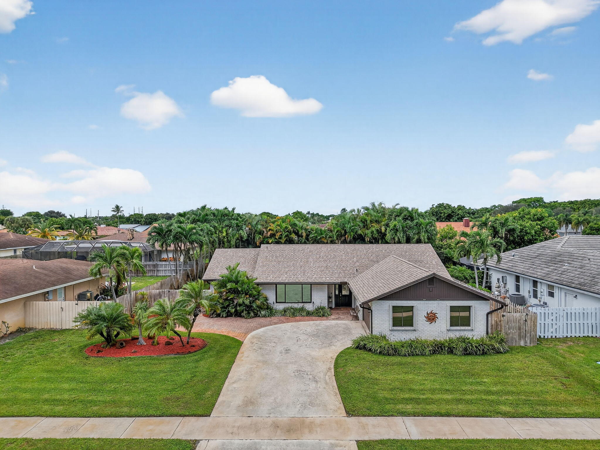 17705 Maplewood Drive Boca Raton, FL 33487 - Photo 49 of 71 a view of house with garden space and street view
