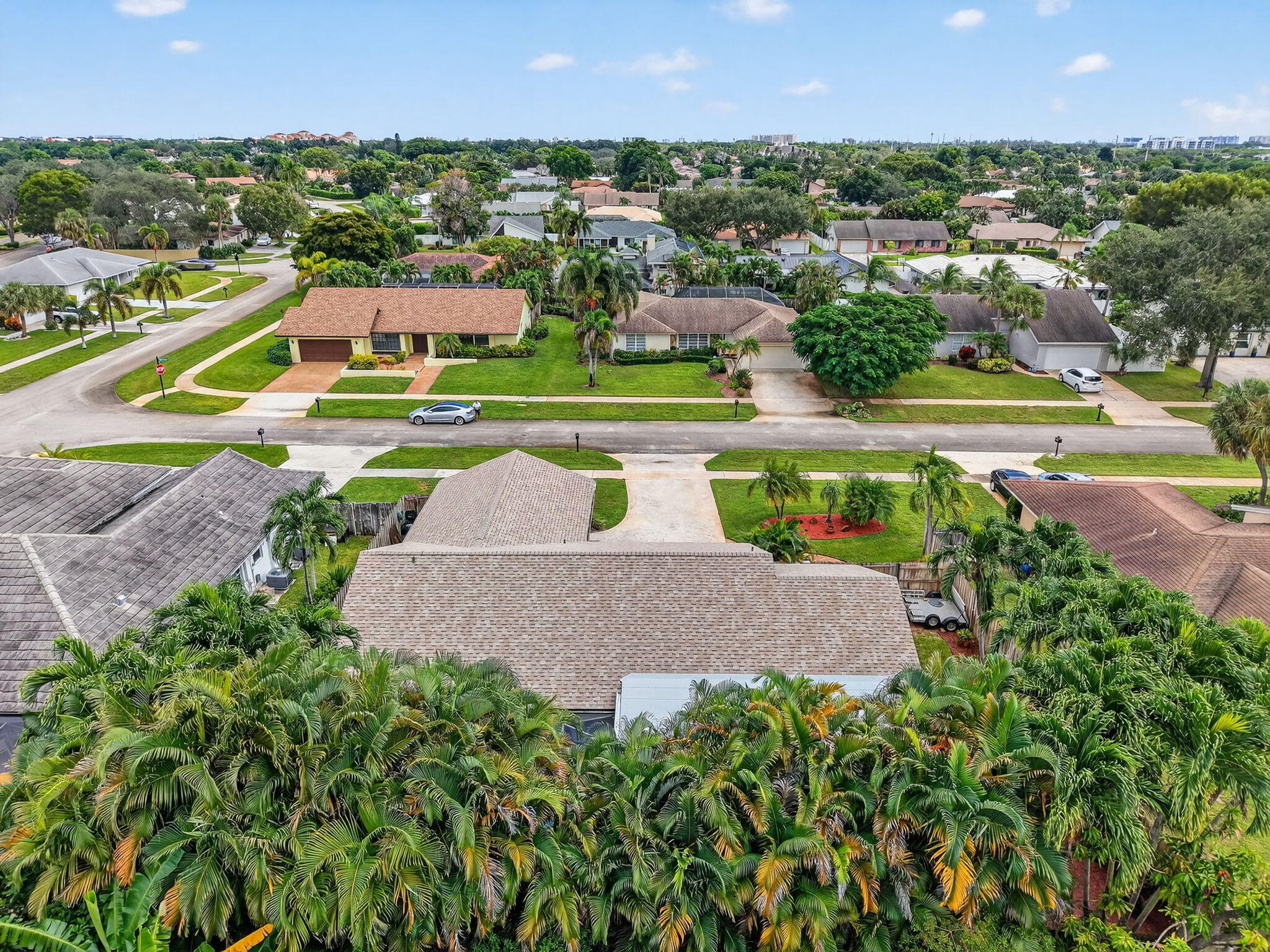 17705 Maplewood Drive Boca Raton, FL 33487 - Photo 53 of 71 an aerial view of a house with a garden and lake view