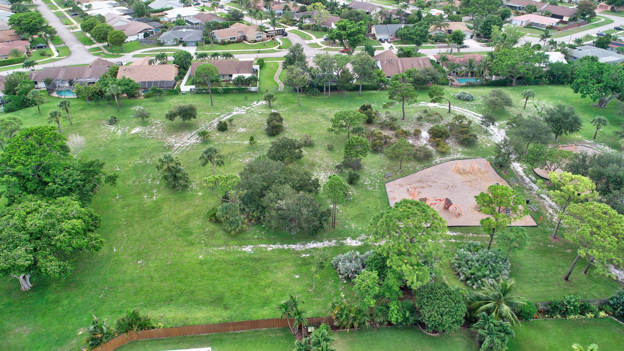 17705 Maplewood Drive Boca Raton, FL 33487 - Photo 64 of 71 an aerial view of residential houses with outdoor space and trees