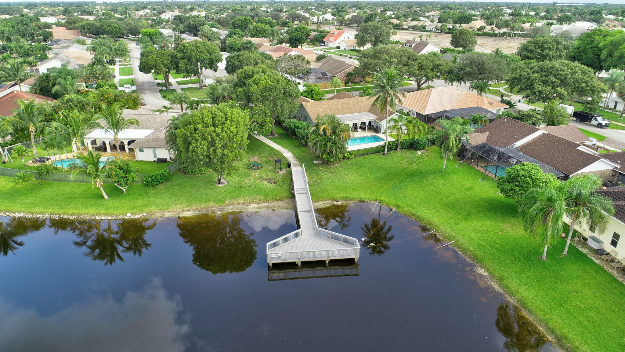 17705 Maplewood Drive Boca Raton, FL 33487 - Photo 68 of 71 an aerial view of a house with a yard basket ball court and outdoor seating