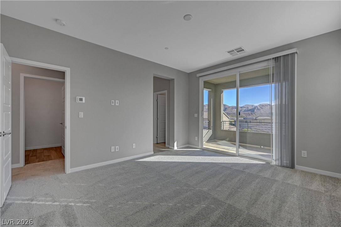 19 Strada Barbera Henderson, NV 89011 - Photo 26 of 53 primary bedroom with balcony and ensuite bath