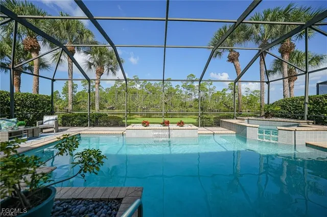 a view of a swimming pool with a patio