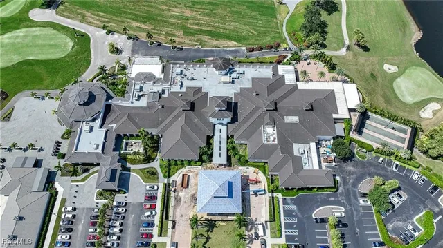 an aerial view of houses with outdoor space