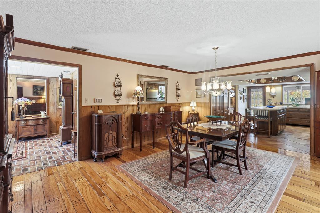 6491 Spruce Creek Road Port Orange, FL 32127 - Photo 14 of 73 a view of a dining room with furniture
