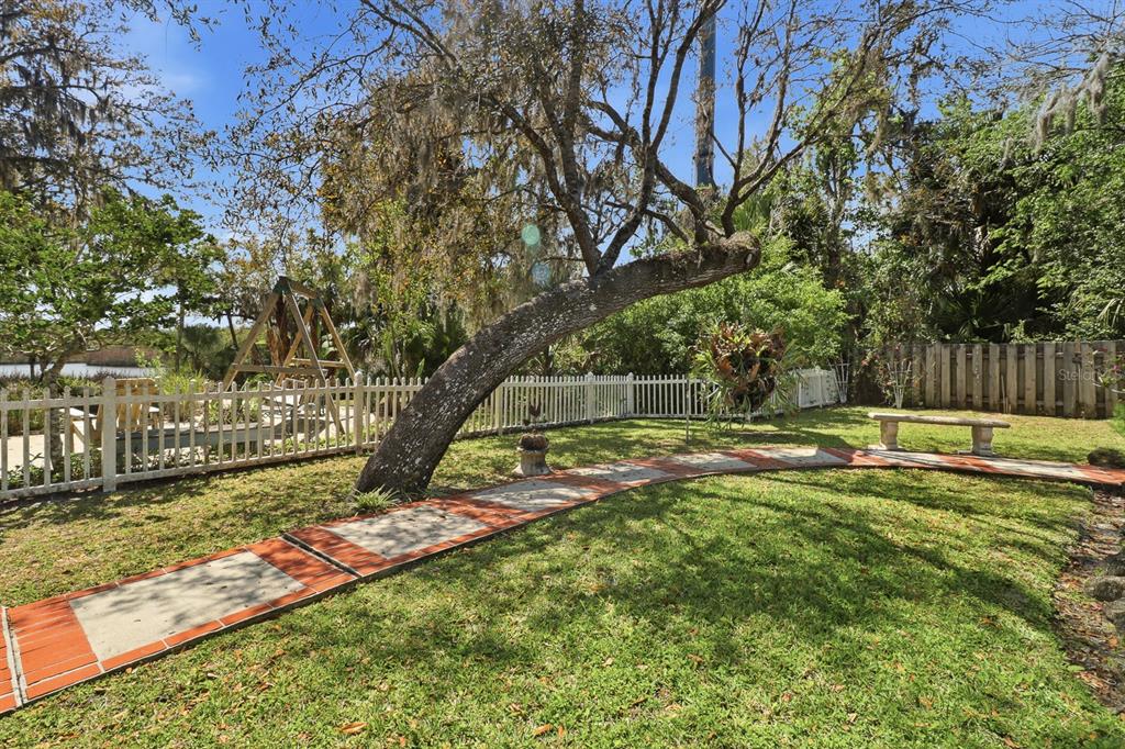 6491 Spruce Creek Road Port Orange, FL 32127 - Photo 38 of 73 a view of swimming pool with a yard