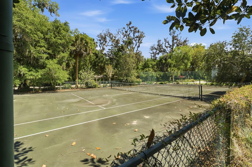 6491 Spruce Creek Road Port Orange, FL 32127 - Photo 53 of 73 a view of a tennis court