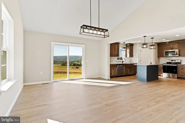 a view of a kitchen with a sink
