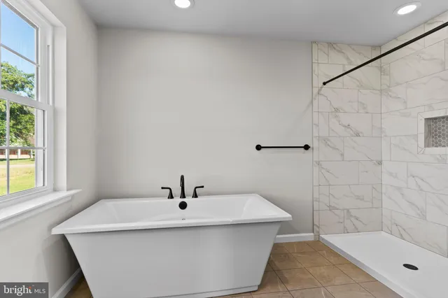 a bathroom with a sink and a bathtub