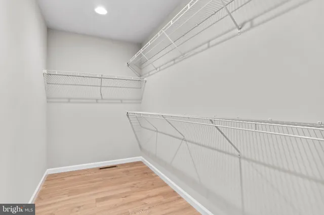 a view of a room with racks on the wall