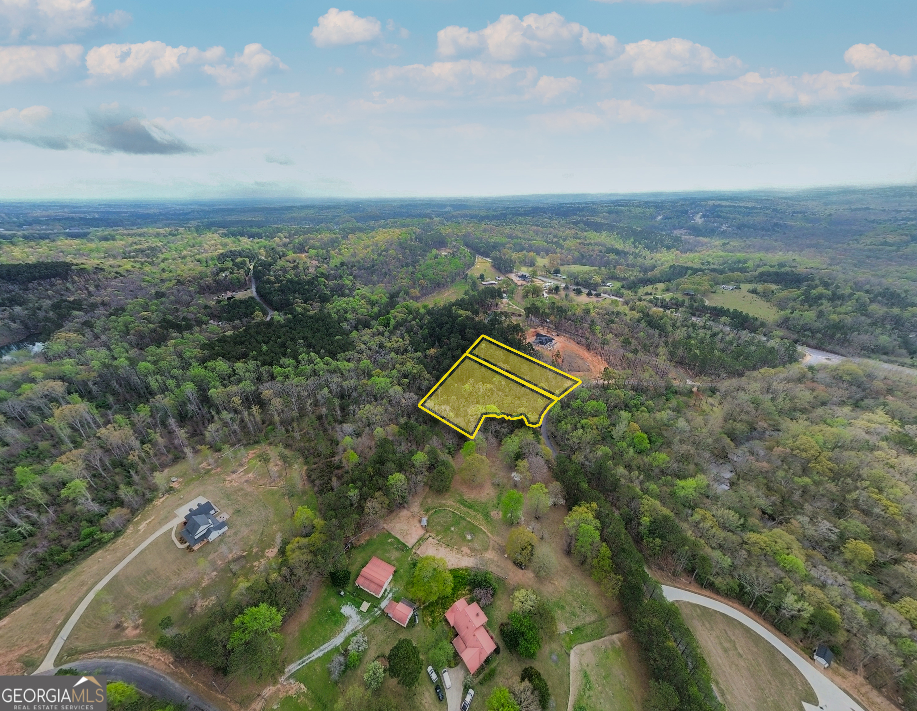 Lot 1 Jack Pittman Road Monroe, GA 30656 - Photo 12 of 15 an aerial view of house with yard and mountain view in back