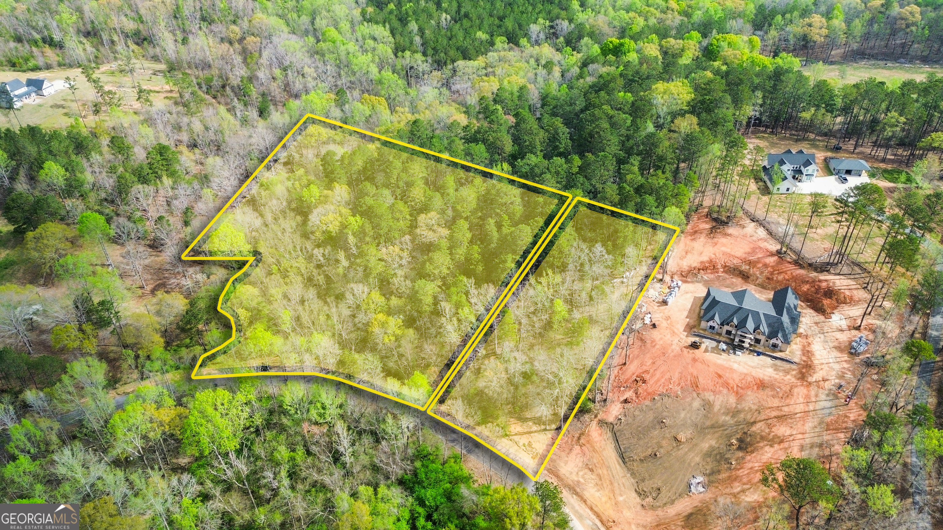 Lot 1 Jack Pittman Road Monroe, GA 30656 - Photo 9 of 15 a blue swimming pool with a garden and plants