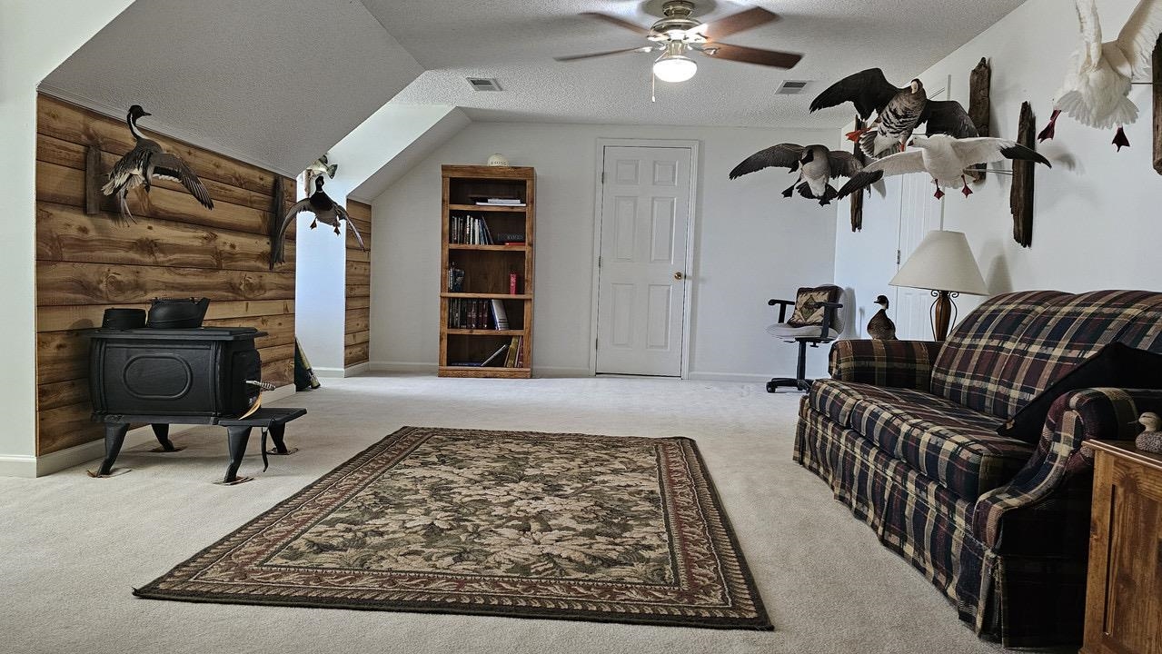 9919 Millington Arlington Road Arlington, TN 38002 - Photo 16 of 22 a living room with furniture bathtub and a rug