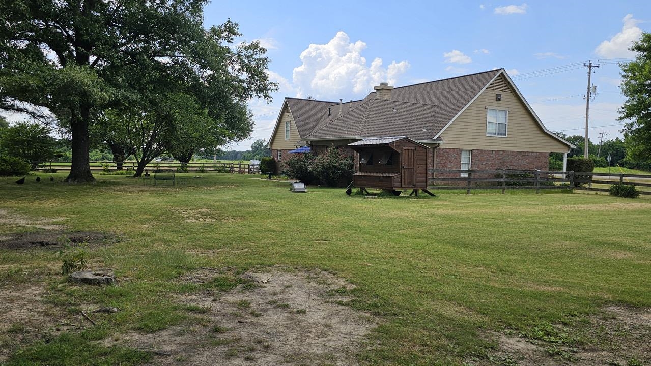 9919 Millington Arlington Road Arlington, TN 38002 - Photo 22 of 22 a house view with a garden space