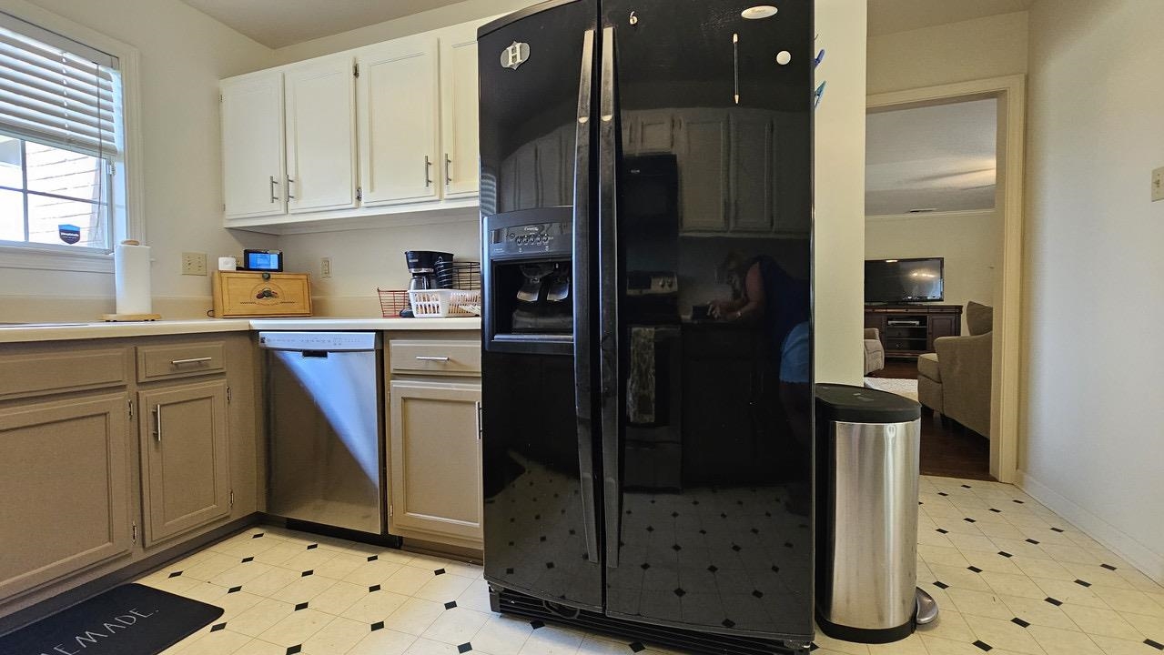 9919 Millington Arlington Road Arlington, TN 38002 - Photo 4 of 22 a kitchen with stainless steel appliances granite countertop a refrigerator and a stove