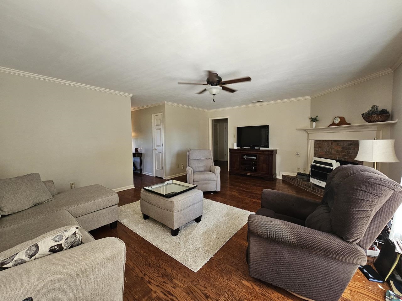 9919 Millington Arlington Road Arlington, TN 38002 - Photo 7 of 22 a living room with furniture and a flat screen tv