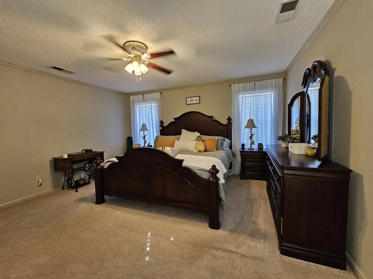 9919 Millington Arlington Road Arlington, TN 38002 - Photo 9 of 22 a bedroom with a bed and a chandelier